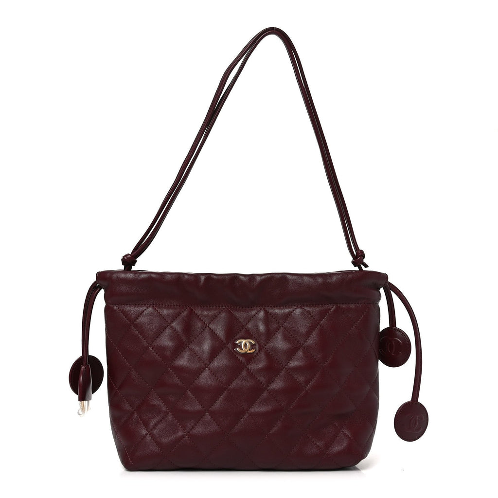 Lambskin Quilted Drawstring Clutch With Strap Dark Burgundy