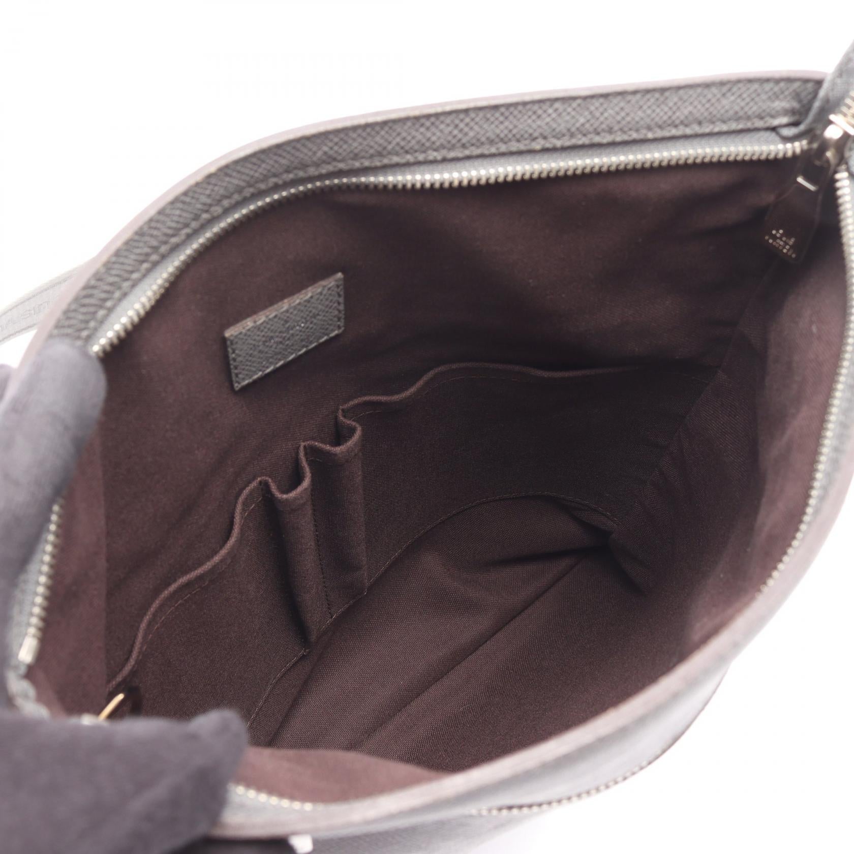 Louis Vuitton Sasha Taiga Leather Shoulder Bag
