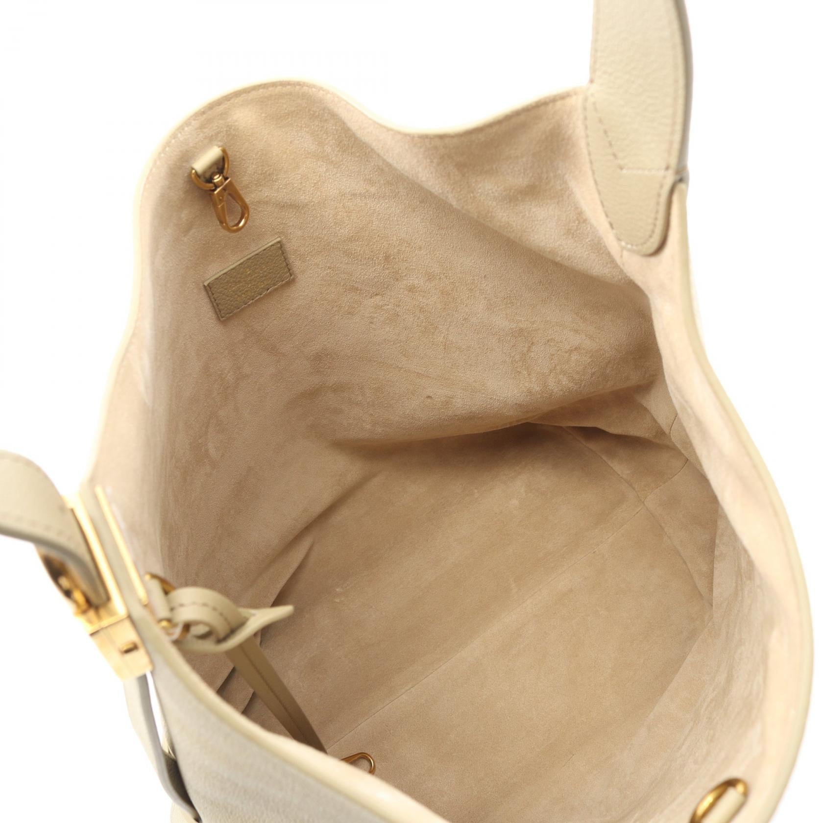 Louis Vuitton Locky Hobo MM Leather Shoulder Bag