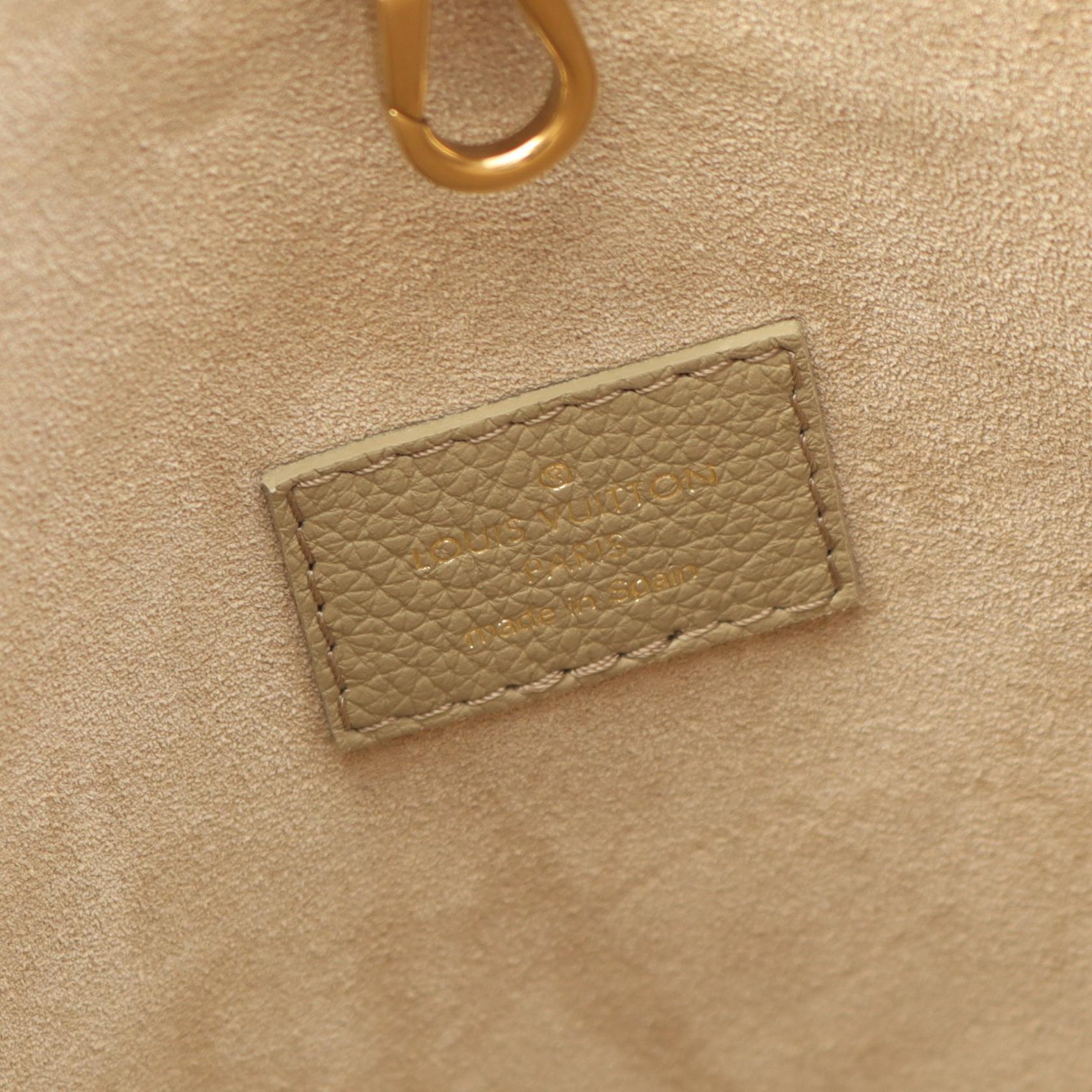 Louis Vuitton Locky Hobo MM Leather Shoulder Bag