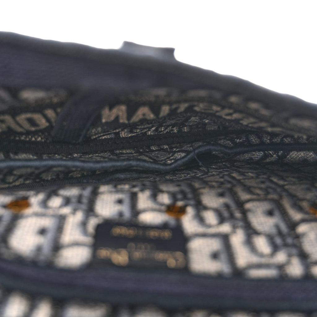 Oblique Embroidered Saddle Bag Blue