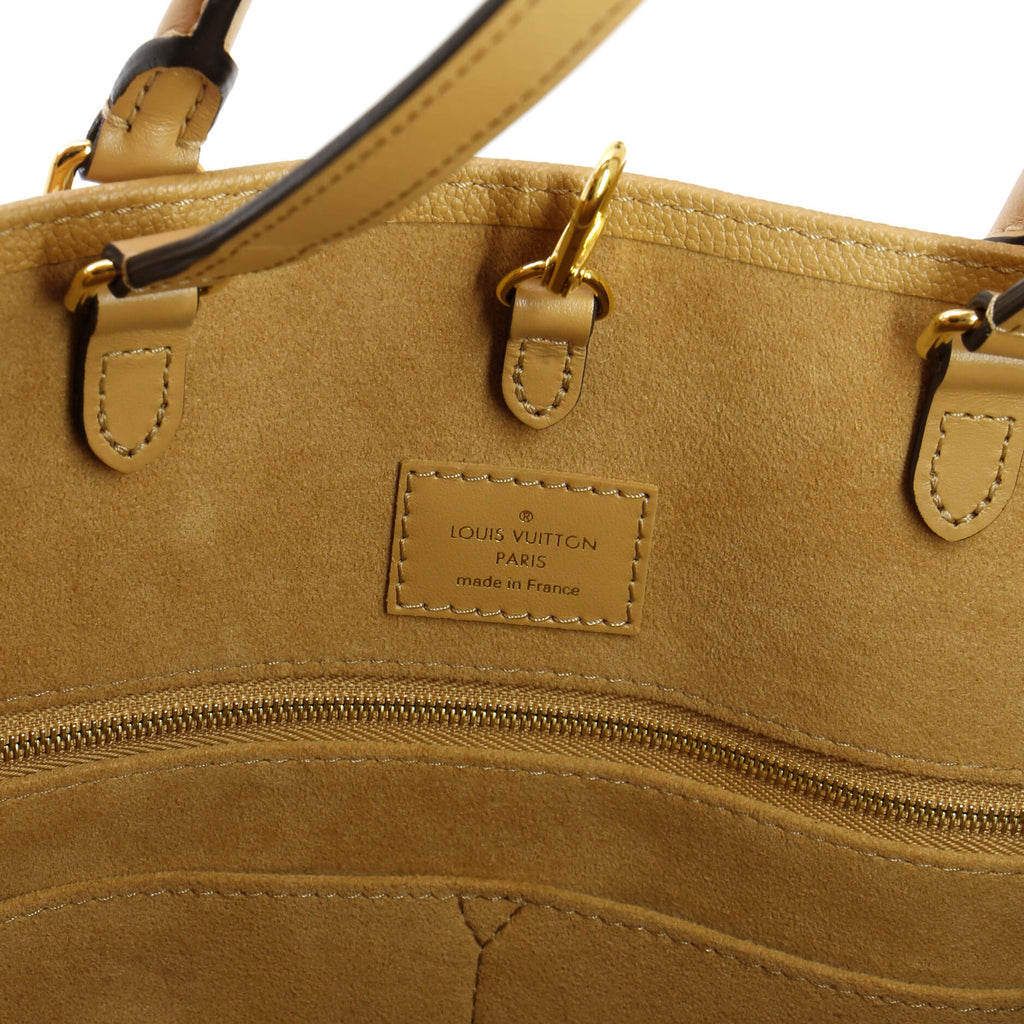 Louis Vuitton OnTheGo Tote Monogram Empreinte Giant Broderies MM