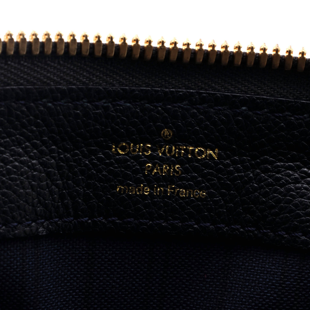 Louis Vuitton Petillante Clutch Monogram Empreinte Leather