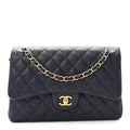 Caviar Quilted Jumbo Double Flap Navy Blue