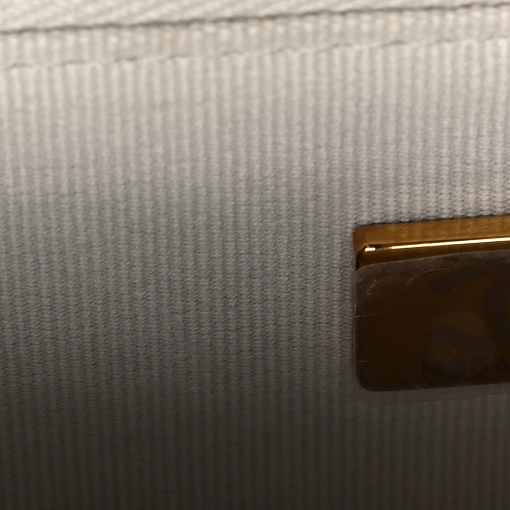 Metallic Lambskin Quilted Top Handle Vanity Case Silver