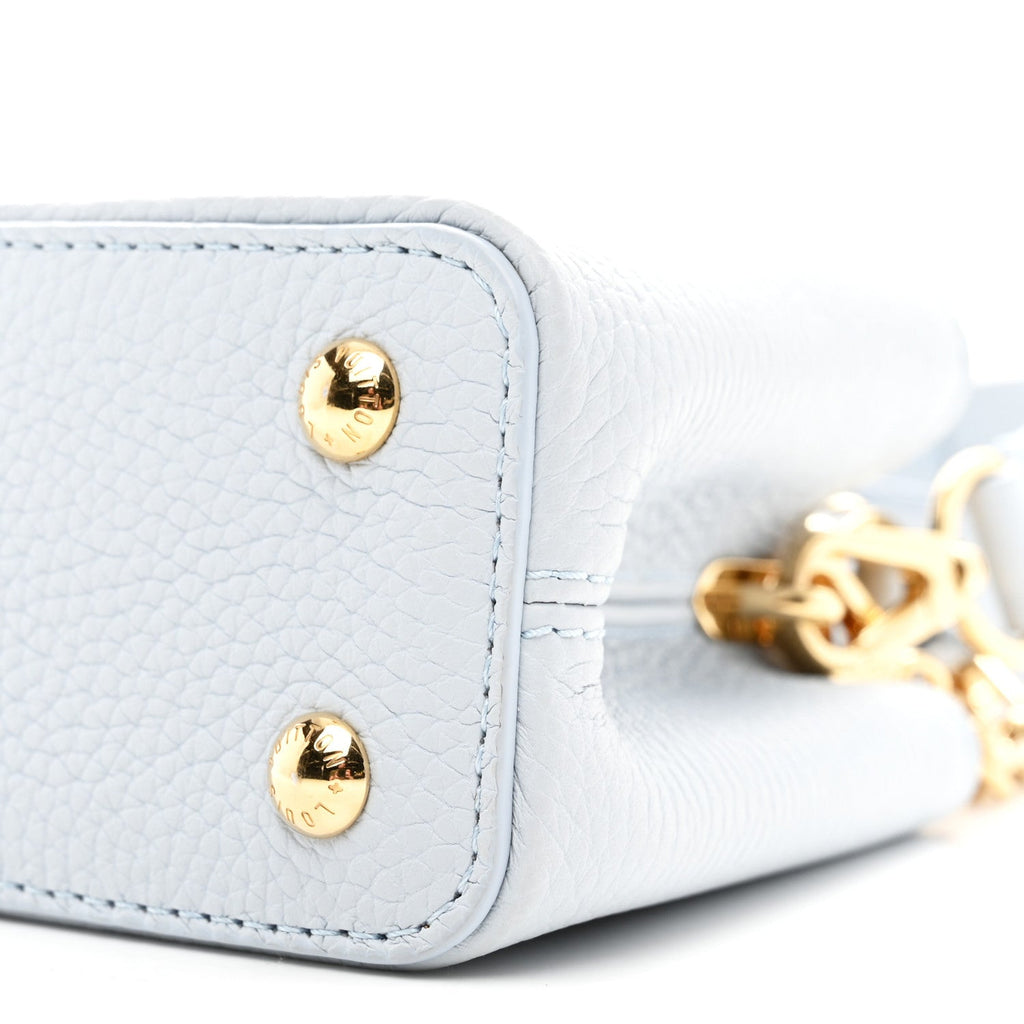 LV X TM Taurillon Capucines East West Mini Olympe Blue