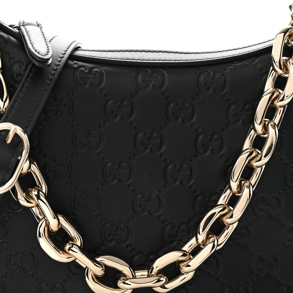 GG Calfskin Embossed Emblem Medium Half Moon Shoulder Bag Black