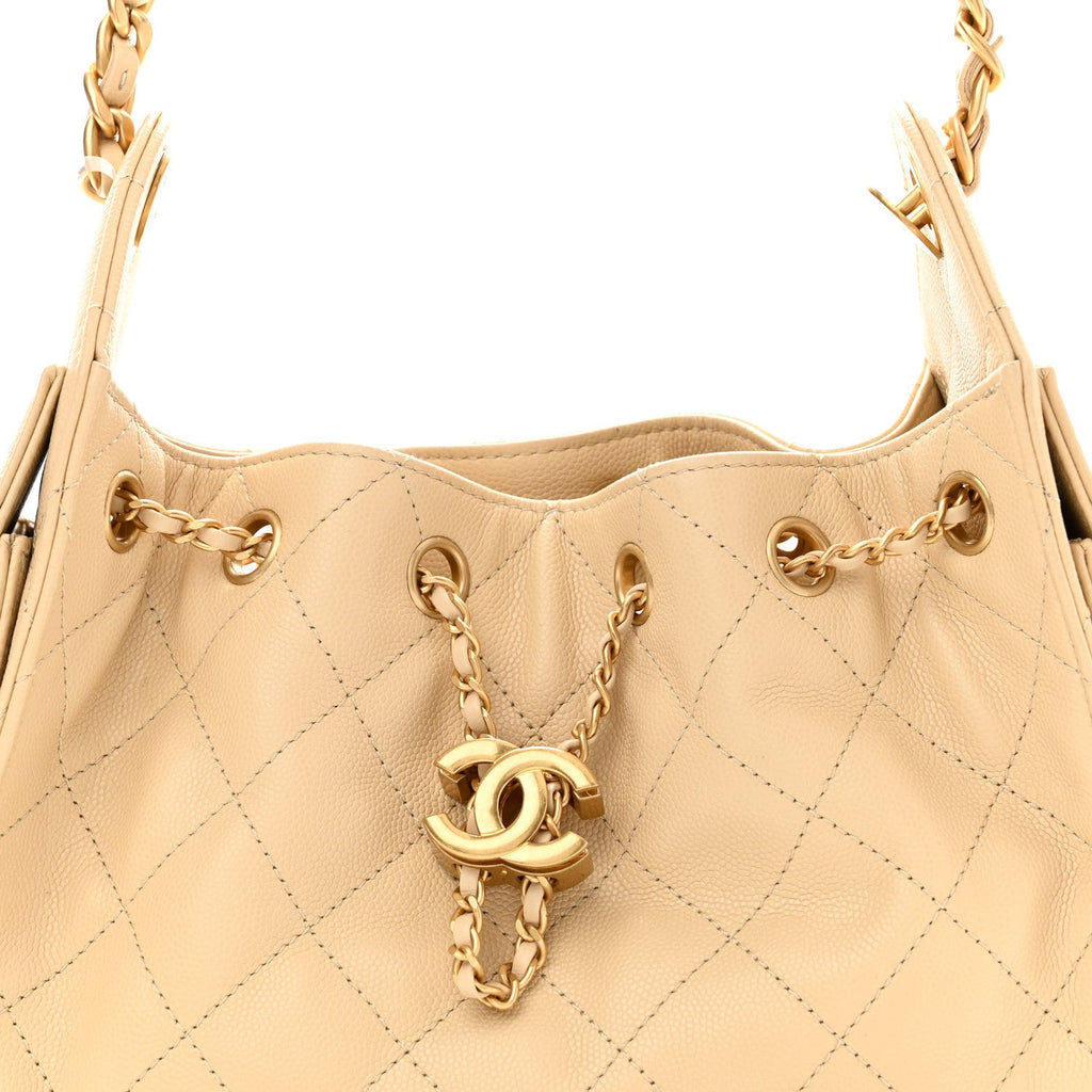 Caviar Quilted Mini Chanel 25 Handbag Beige