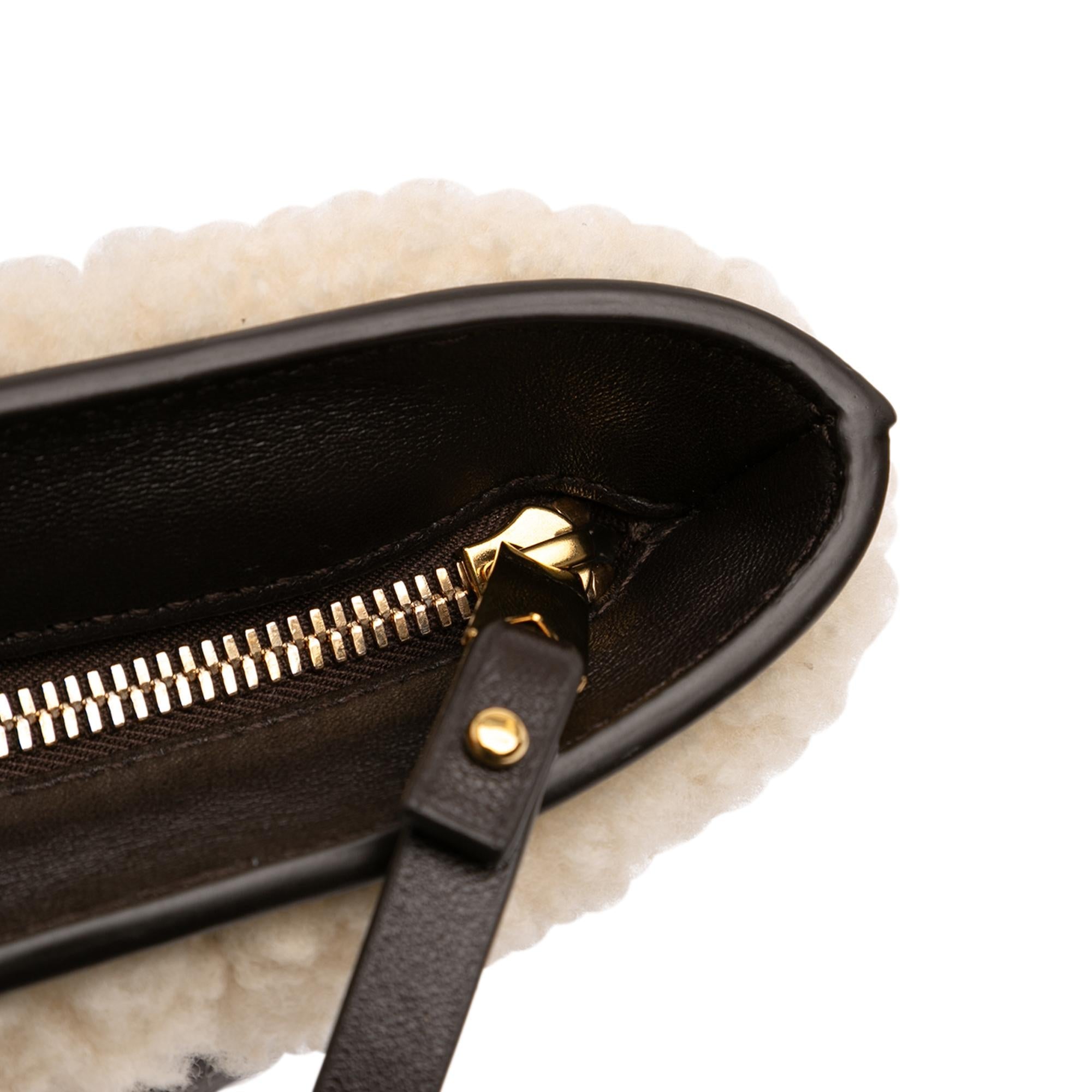 Bottega Veneta Shearling Trimmed Leather Clutch