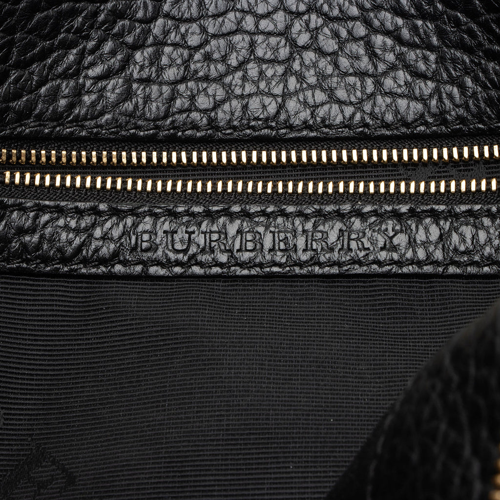 Burberry Leather Embossed Check Chichester Clutch (SHF-TC4VkJ)