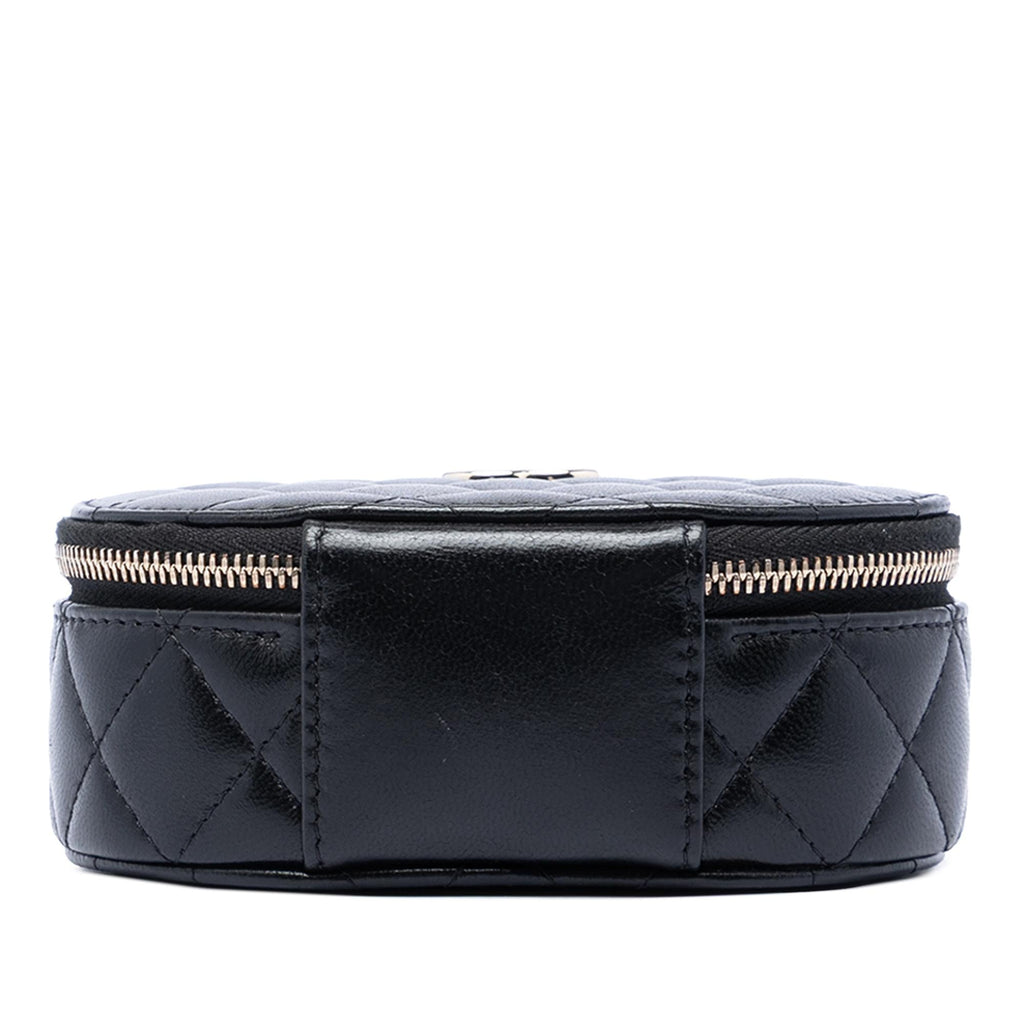 Chanel CC Quilted Lambskin Oval Top Handle Clutch