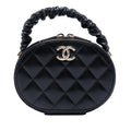 Chanel CC Quilted Lambskin Oval Top Handle Clutch