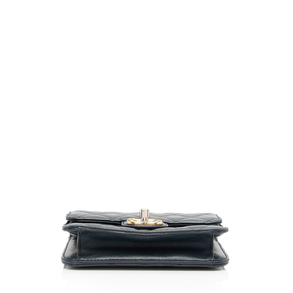 Chanel Lambskin Crossing Times Mini Flap Bag (SHF-Tv2M1K)