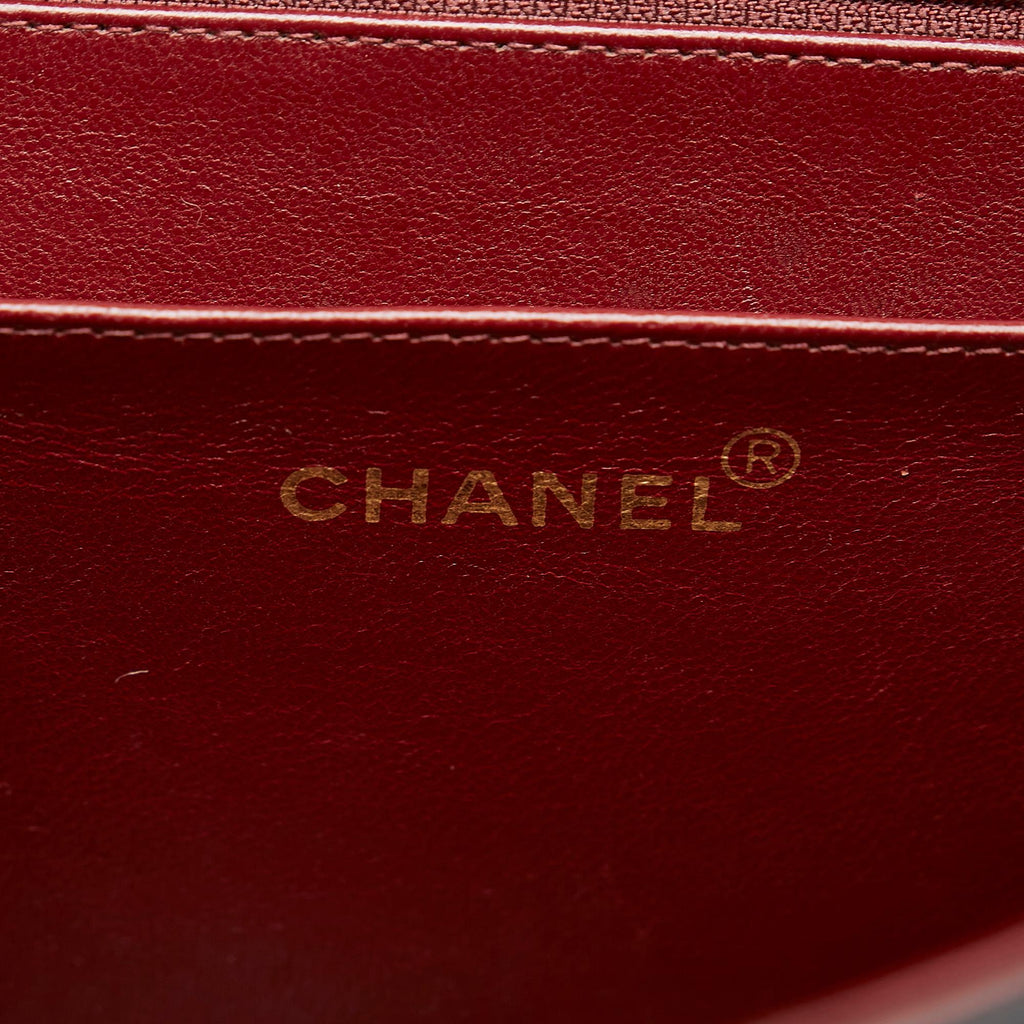 Chanel Maxi Classic Lambskin Single Flap (SHG-bKU9pk)