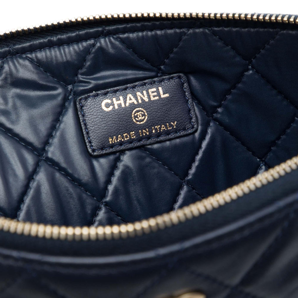 Chanel Medium Quilted Lambskin O Case Clutch