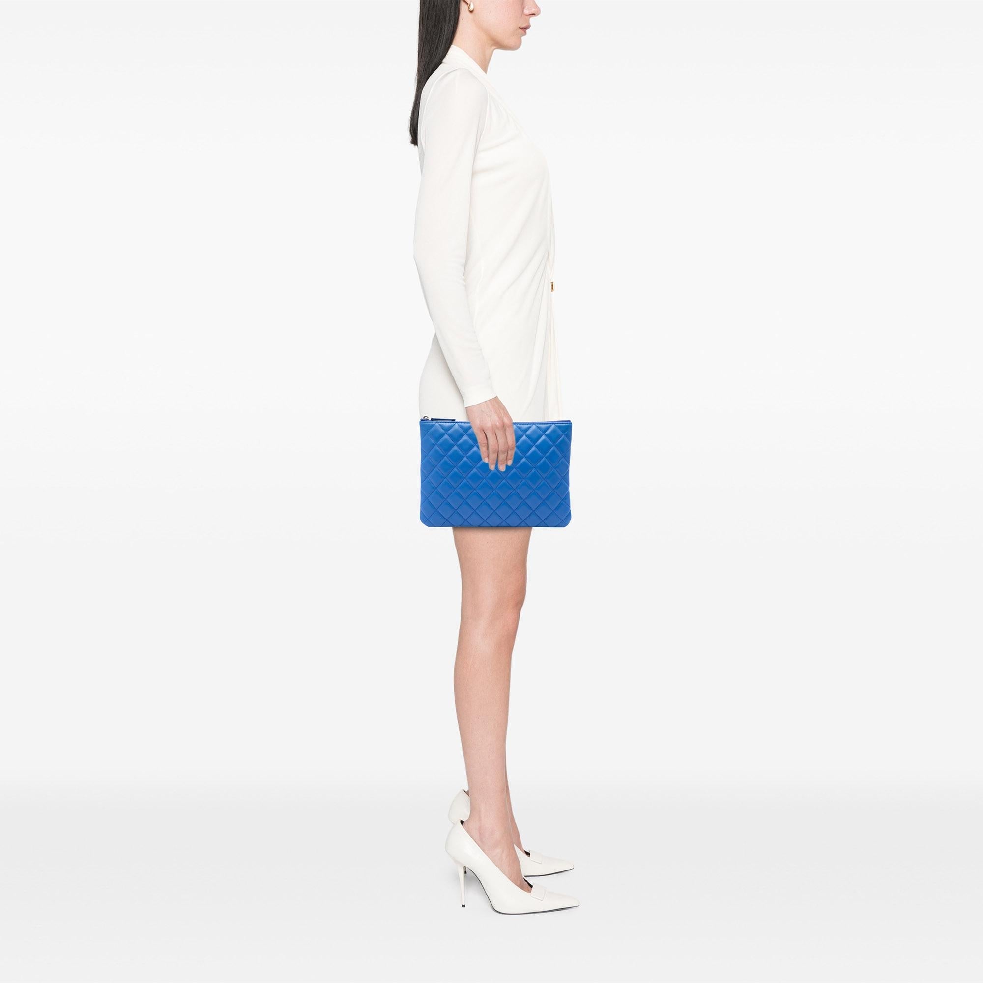 Chanel Medium Quilted Lambskin O Case Clutch
