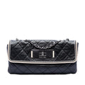 Chanel Quilted Lambskin East West Mademoiselle Flap