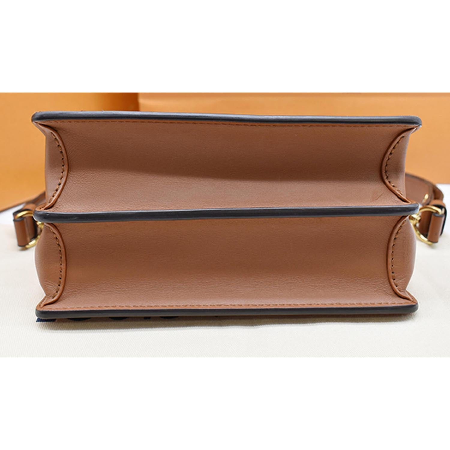 LOUIS VUITTON Dauphine Mini Monogram Reverse Canvas Shoulder Bag Brown