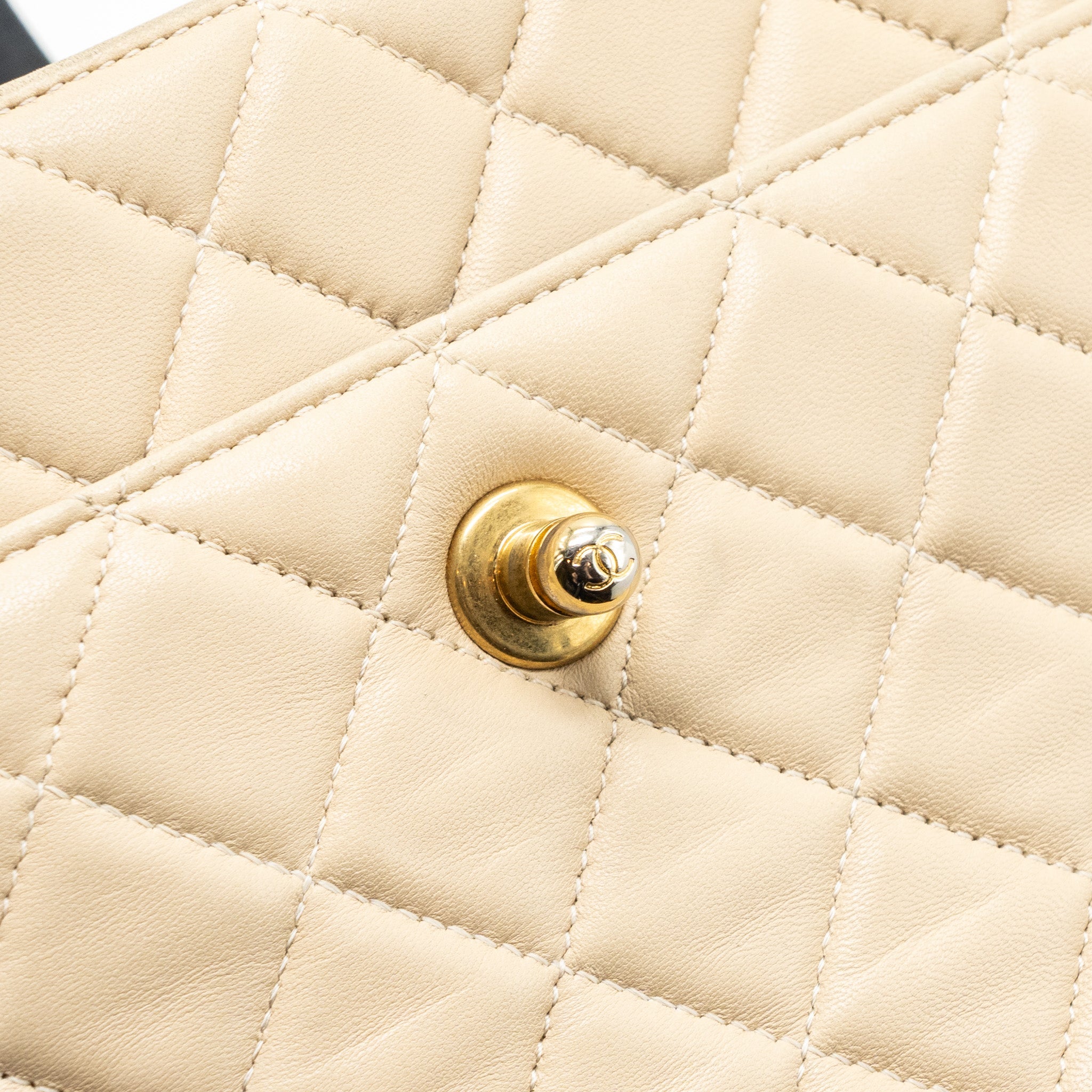 Chanel Quilted small shopping tote bag lambskin beige / black