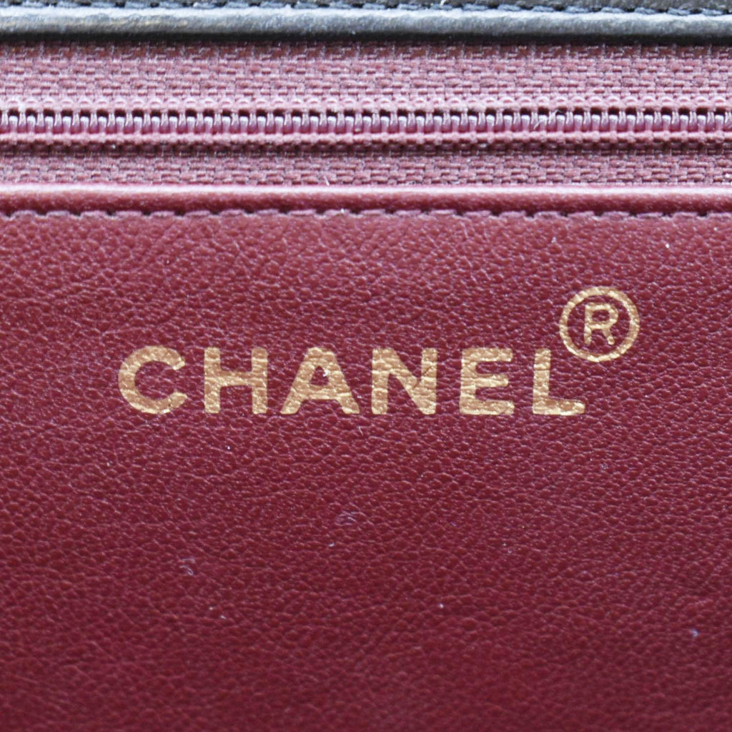 CHANEL Half Flap Medium Quilted Leather Shoulder Bag Black