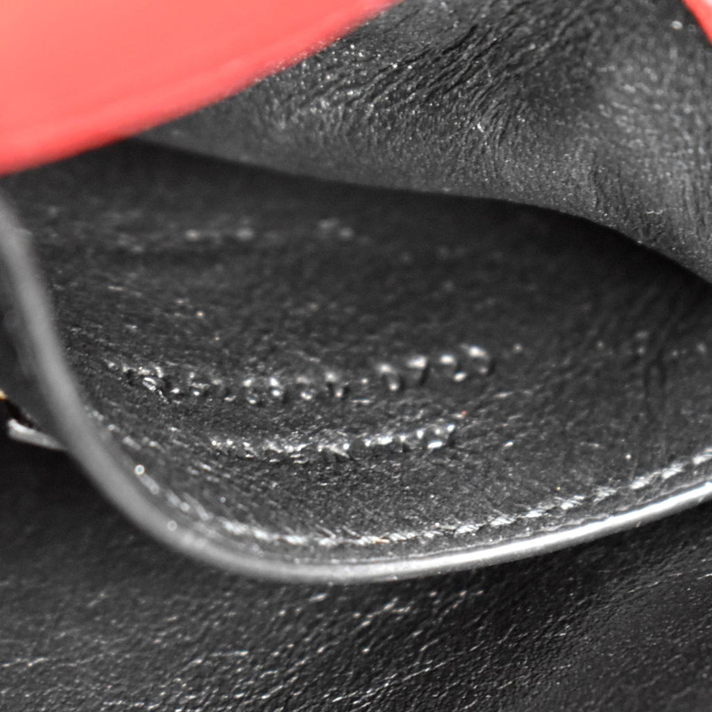 YVES SAINT LAURENT Cassandra Top Handle Embossed Leather Shoulder Bag Red