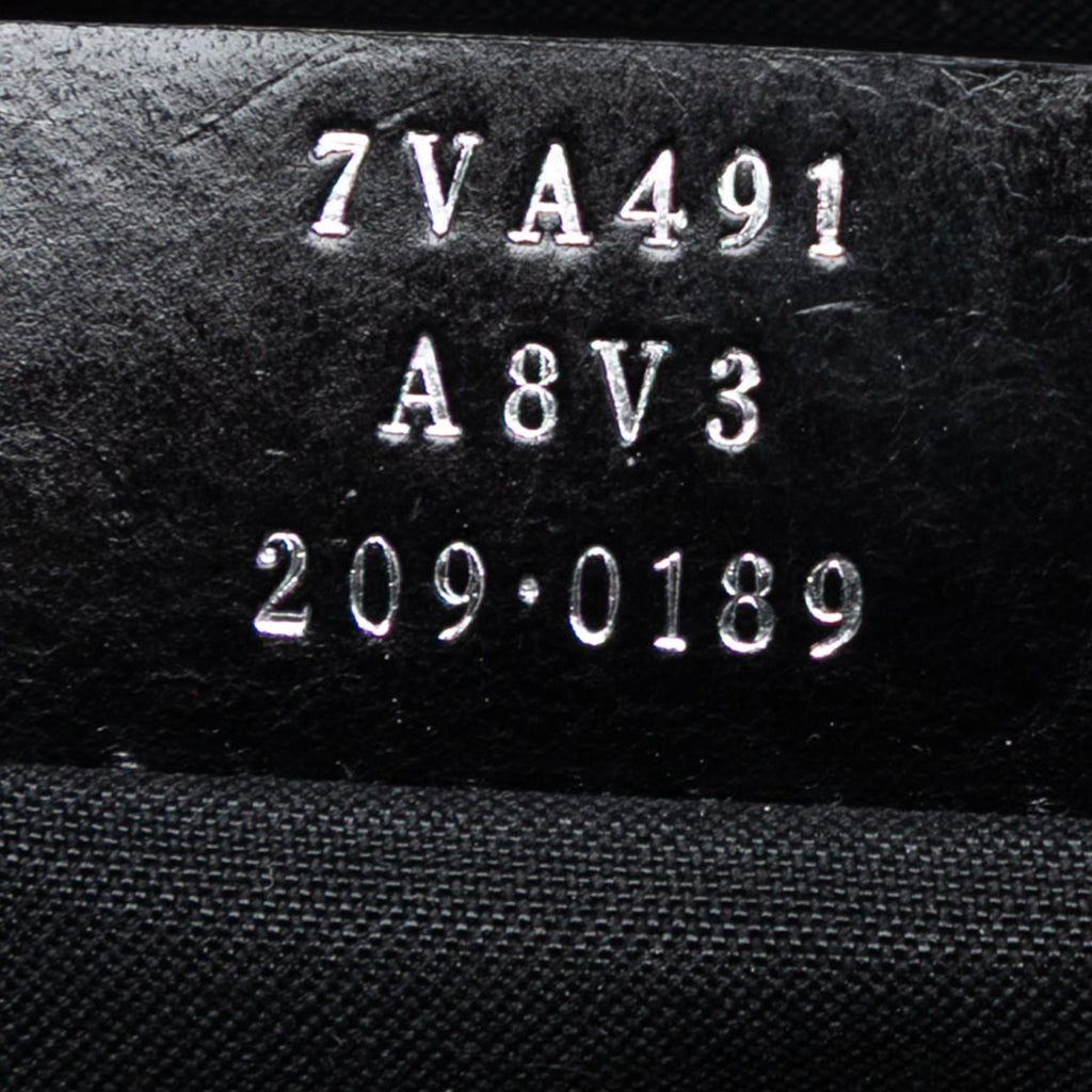 Fendi Studded Leather Trimmed Zucca Coated Canvas Clutch