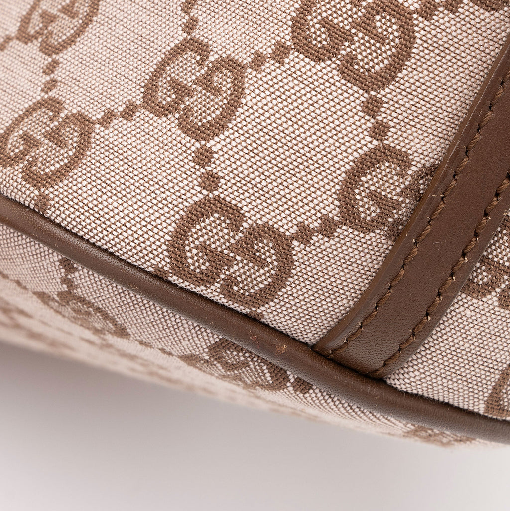 Gucci GG Canvas Classic Pochette (SHF-yWvmJf)