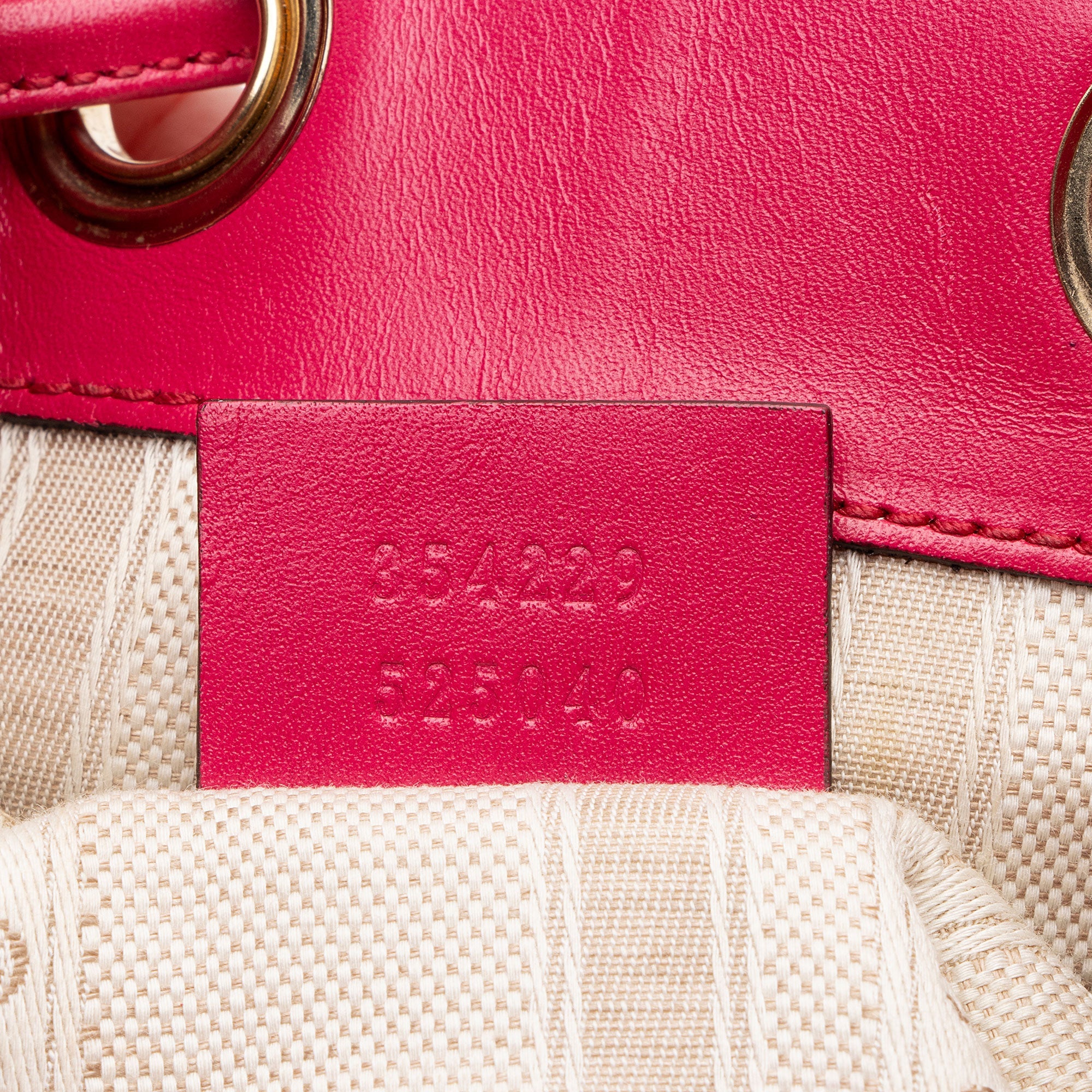 Gucci GG Debossed Leather Studded Bright Bucket Bag