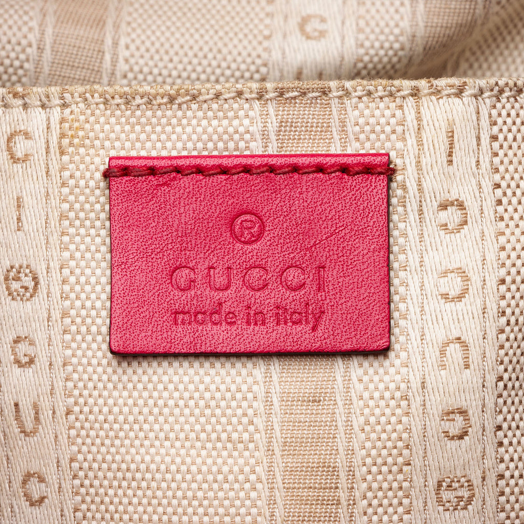 Gucci GG Debossed Leather Studded Bright Bucket Bag