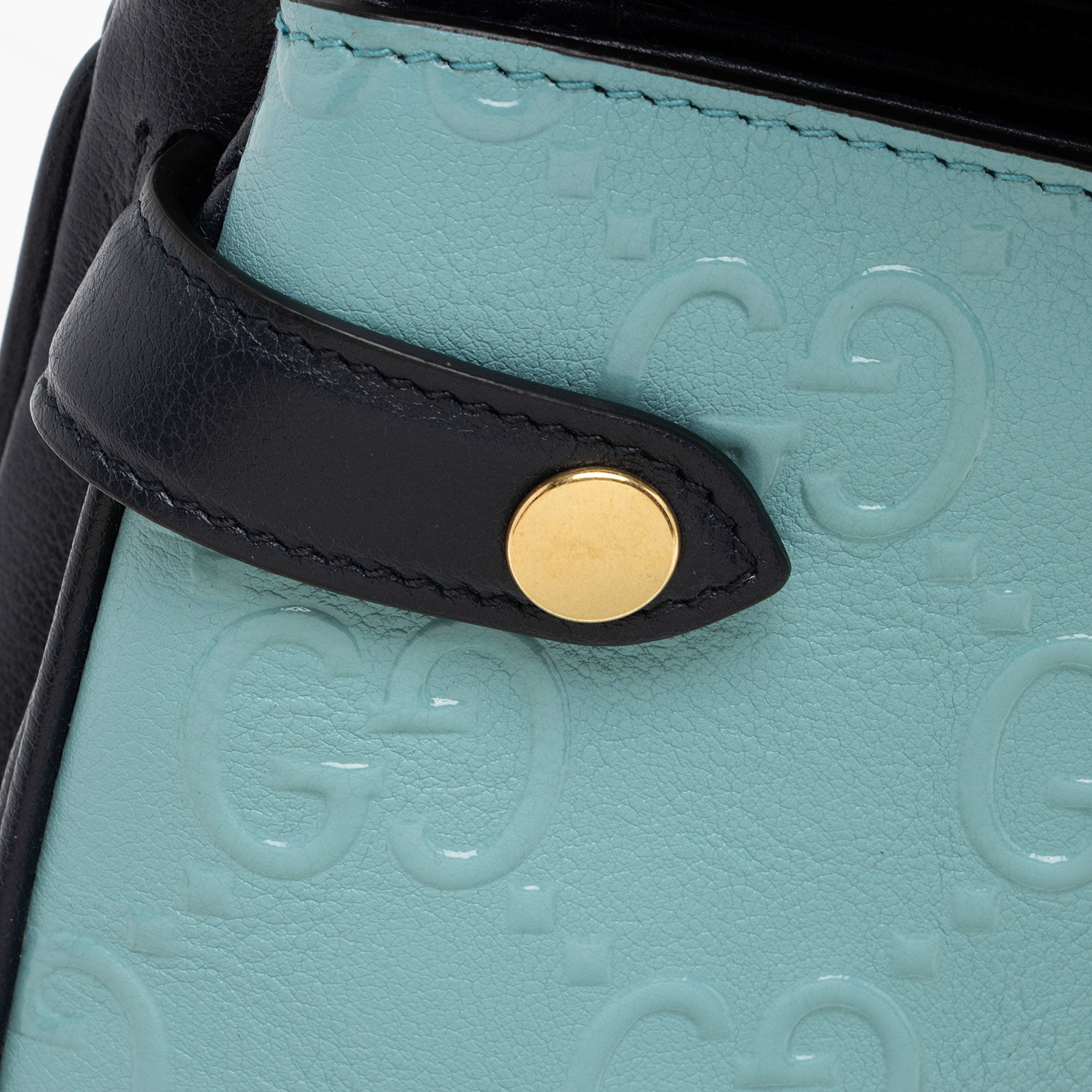 Gucci GG Debossed Leather Small Top Handle (SHF-ur1BGP)