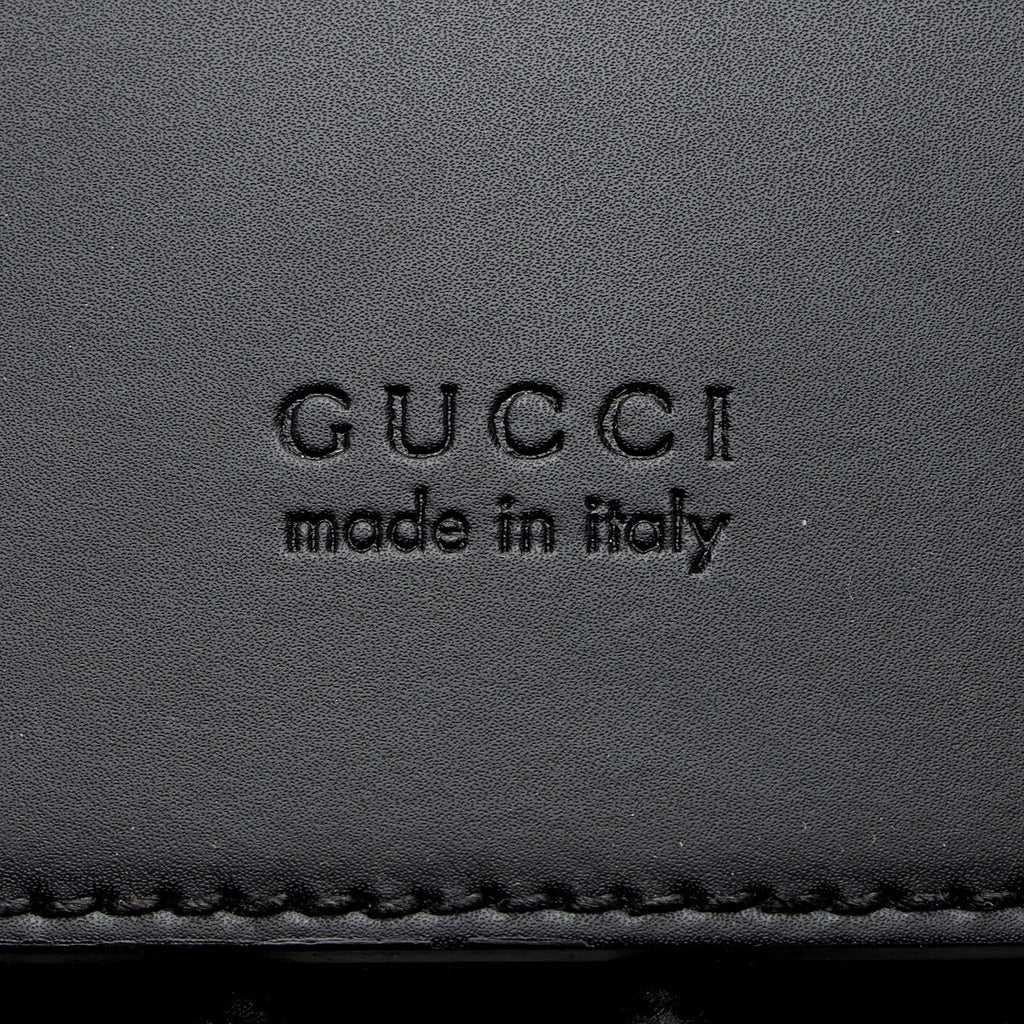 Gucci GG Supreme Medium Flap Backpack (SHF-NNj9Jx)
