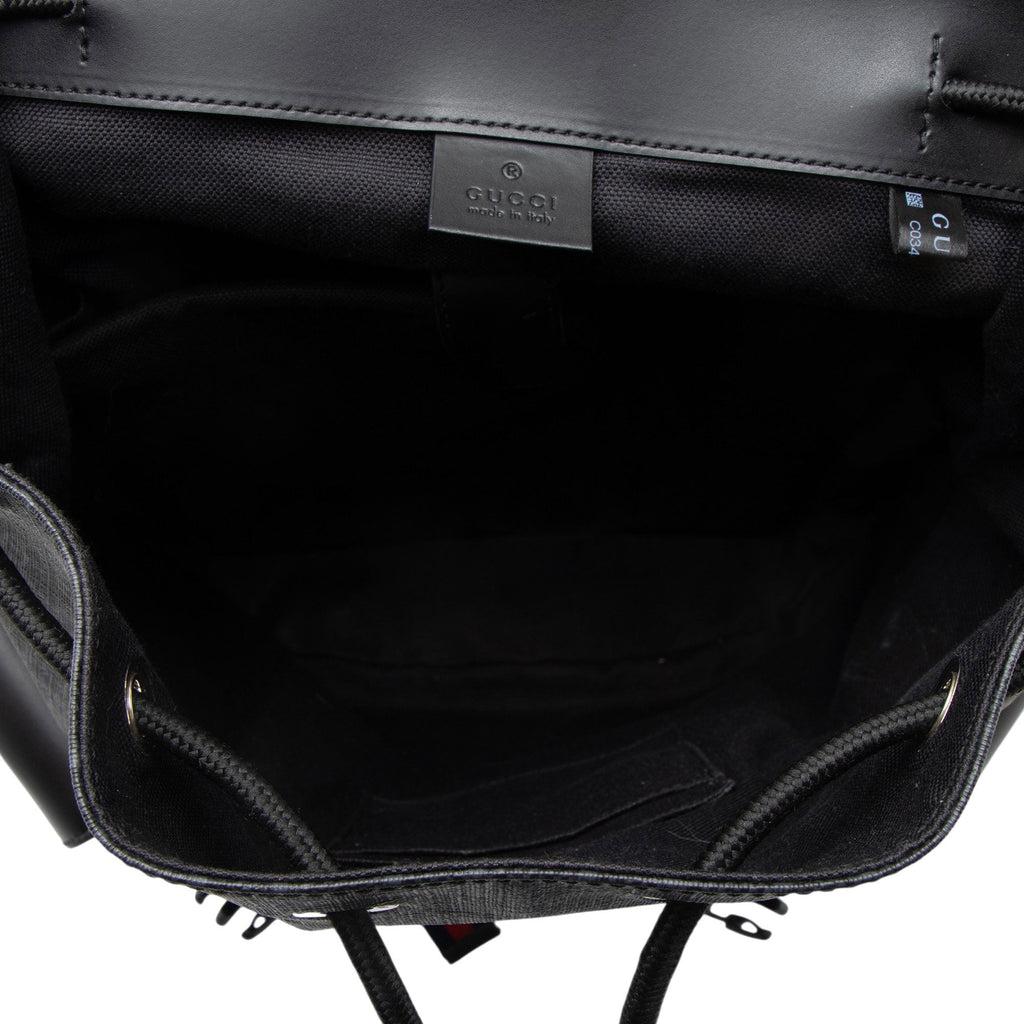 Gucci GG Supreme Medium Flap Backpack