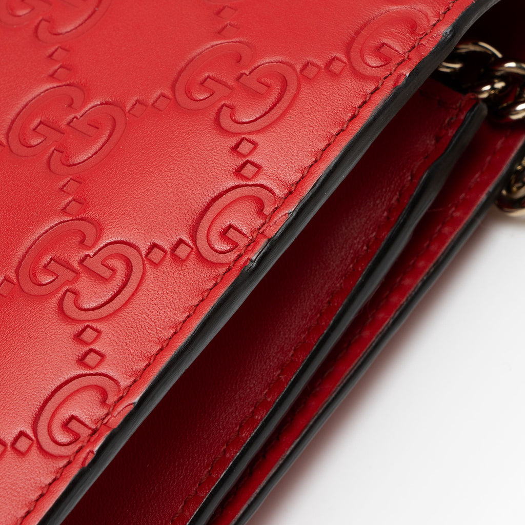 Gucci Guccissima Leather Signature Bow Mini Wallet on Chain