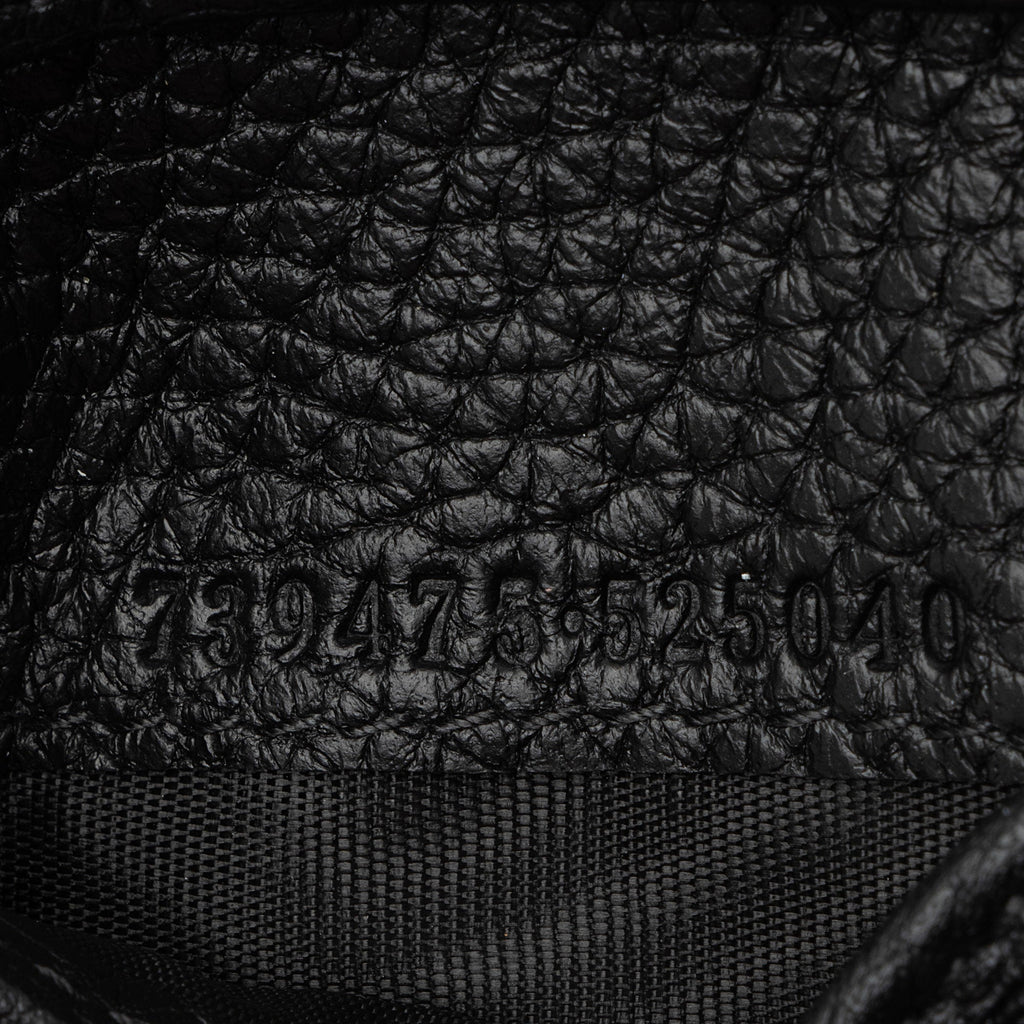 Gucci Jumbo GG Embossed Leather Bifold Wallet