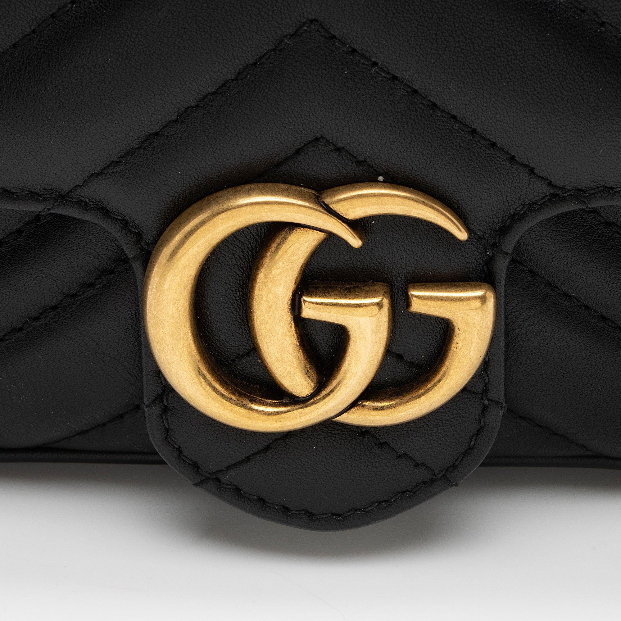 Gucci Matelasse Leather GG Marmont Super Mini Flap Bag (SHF-fWvNlT)