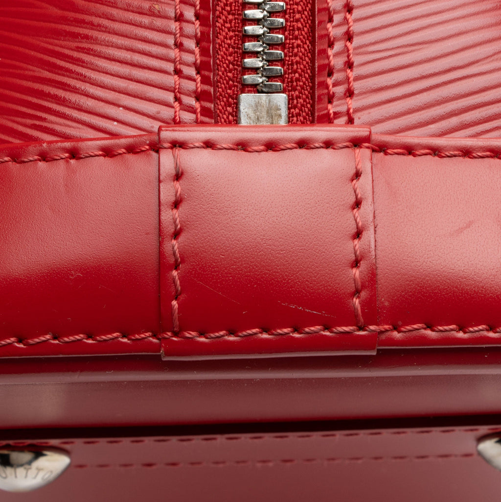 Louis Vuitton Epi Leather Alma PM Satchel (SHF-WDQc4X)