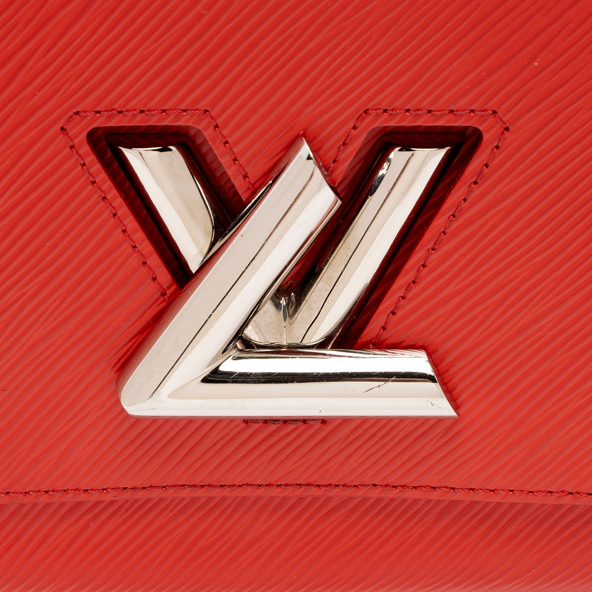 Louis Vuitton Epi Leather Twist MM Shoulder Bag (SHF-lAWkvE)