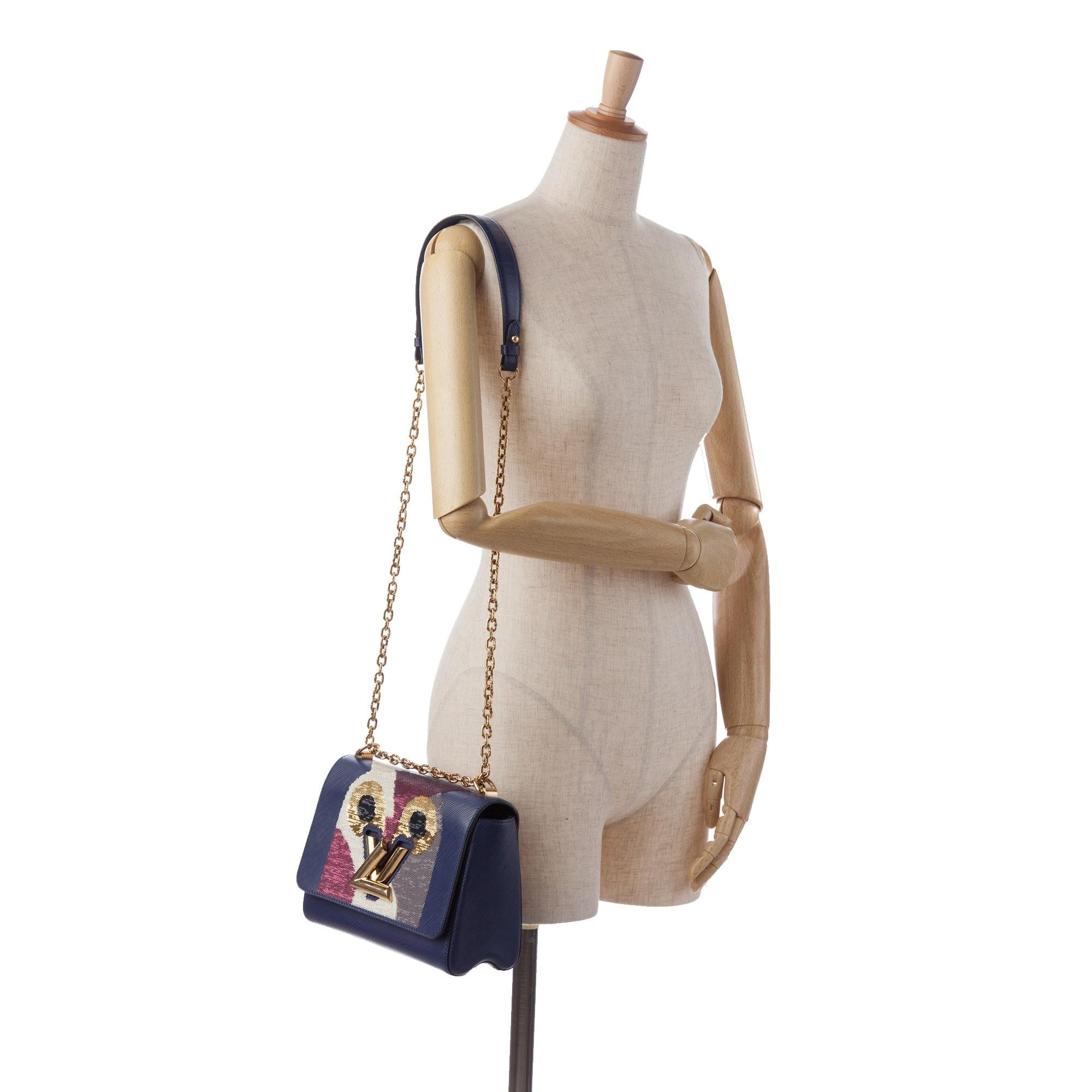 Louis Vuitton Epi Owl Twist MM (SHG-zUbayh)