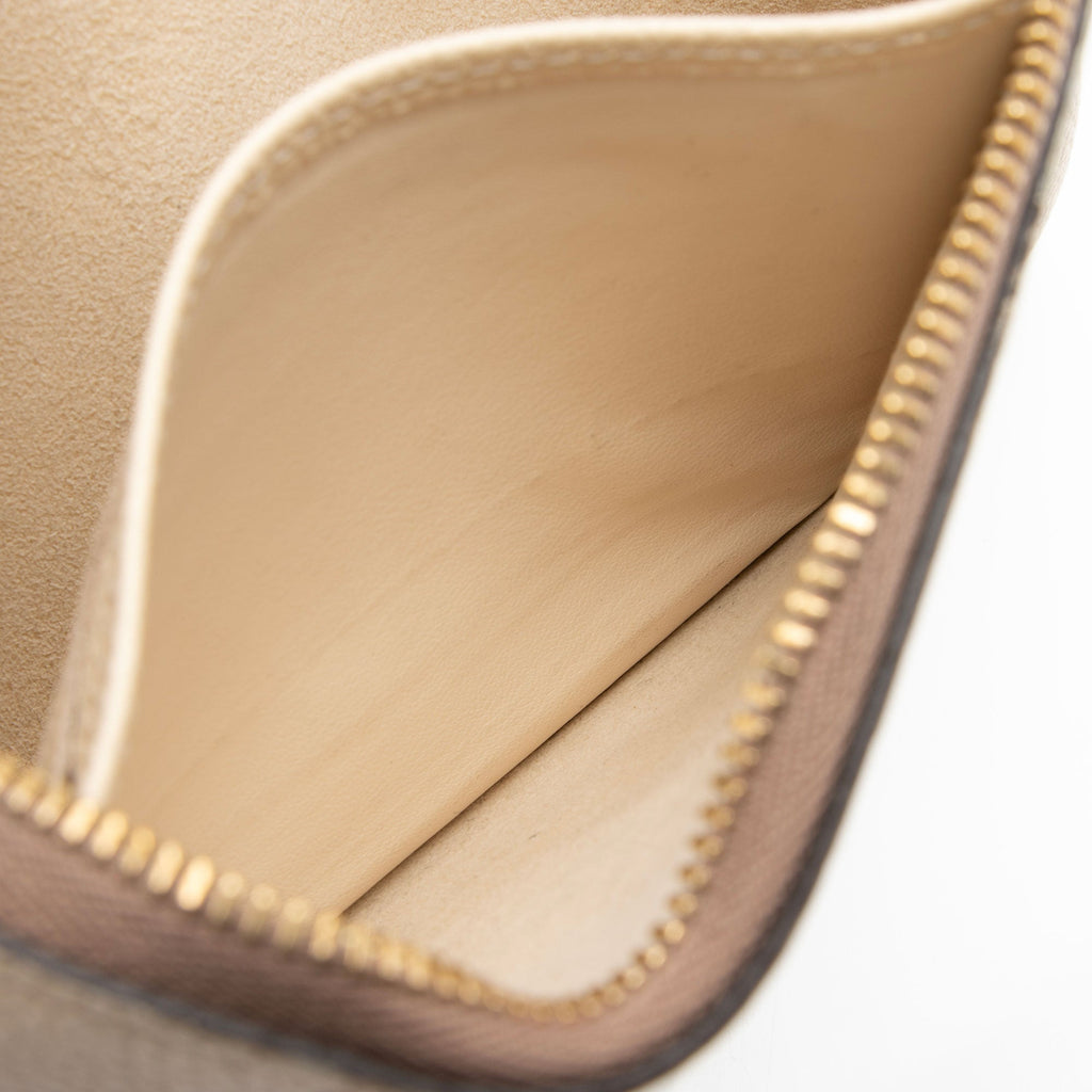 Louis Vuitton Giant Monogram Empreinte Double Zip Pochette (SHF-tJwkDt)