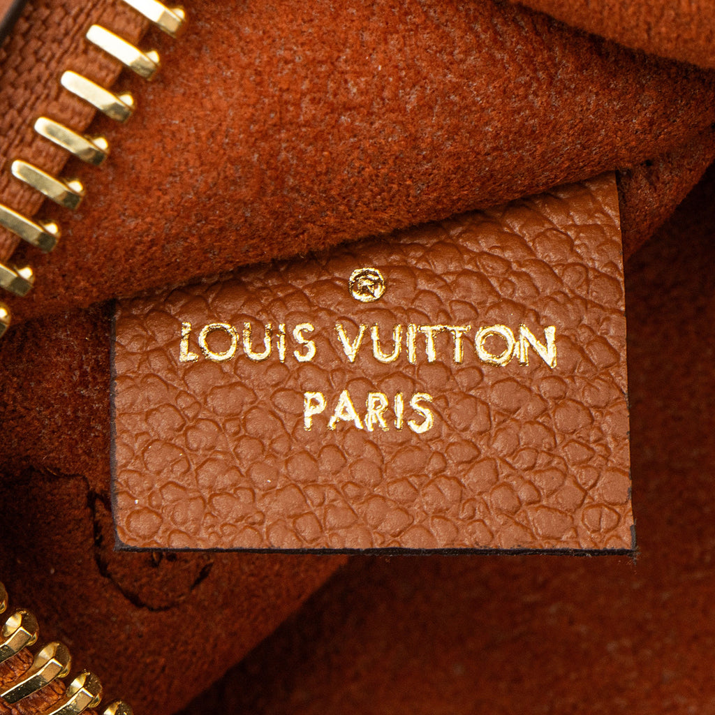 Louis Vuitton Giant Monogram Empreinte Neverfull MM Pochette