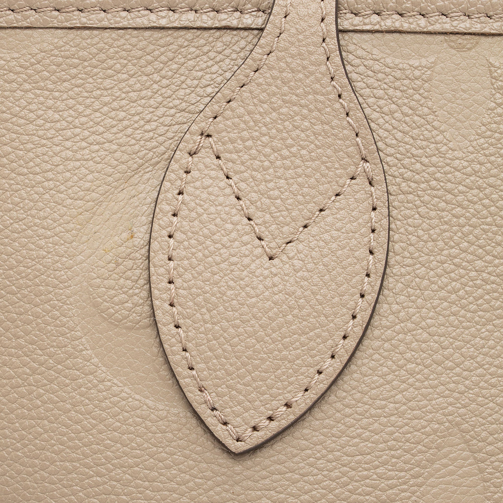 Louis Vuitton Giant Monogram Empreinte Neverfull MM Tote