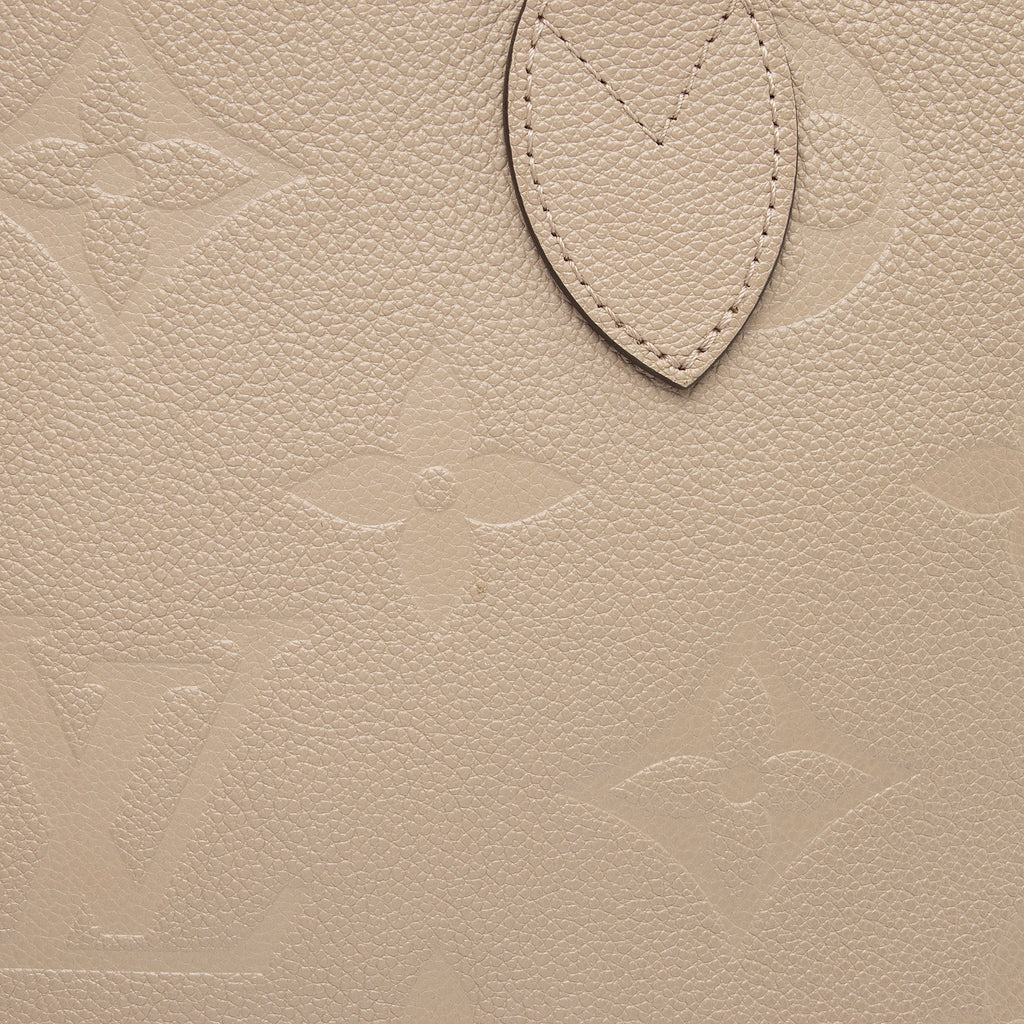 Louis Vuitton Giant Monogram Empreinte Neverfull MM Tote