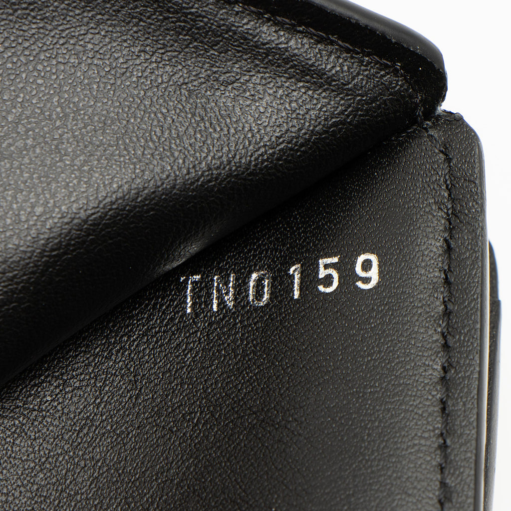 Louis Vuitton Mahina Leather Iris XS Compact Wallet