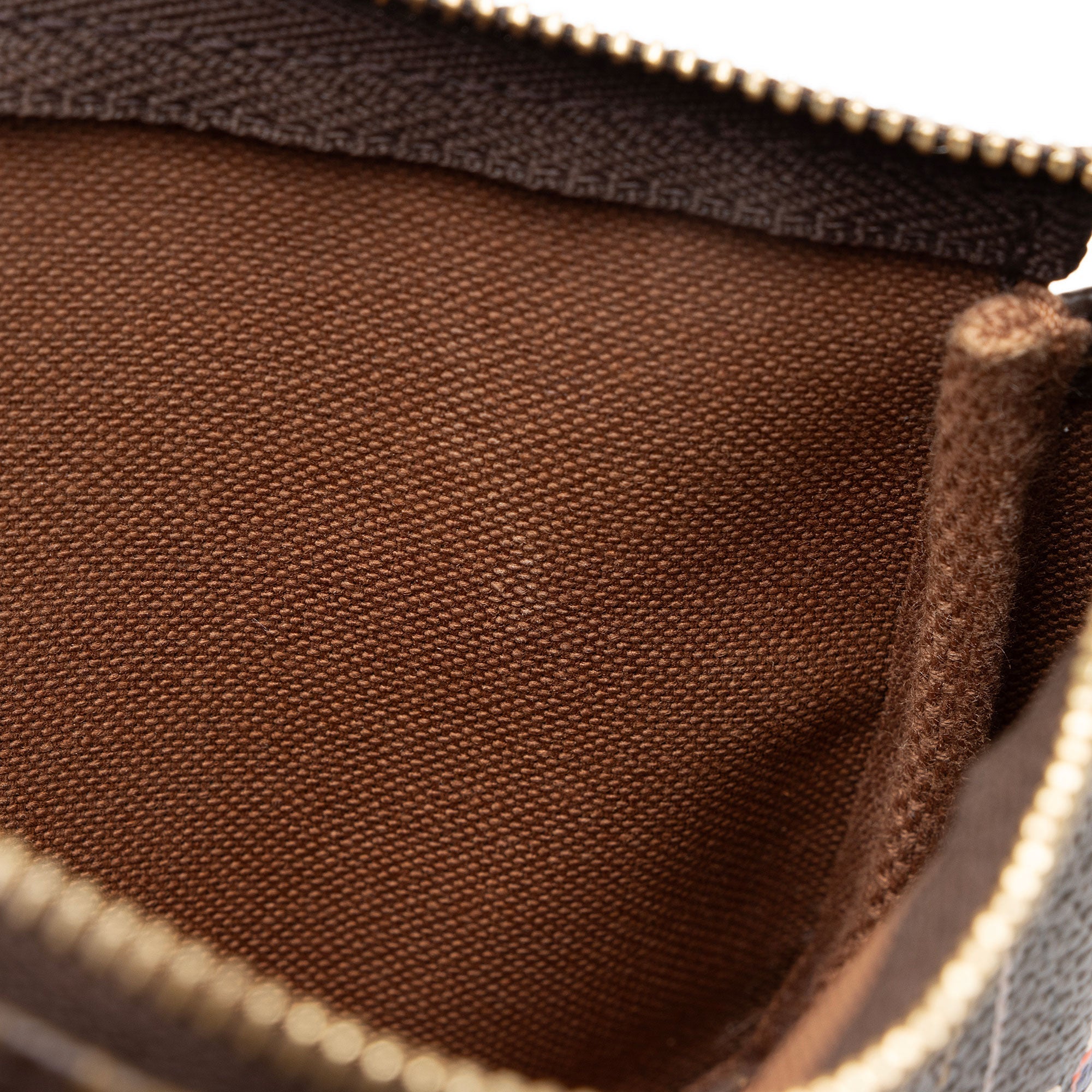 Louis Vuitton Monogram Canvas Transatlantic Mini Pochette Accessoires