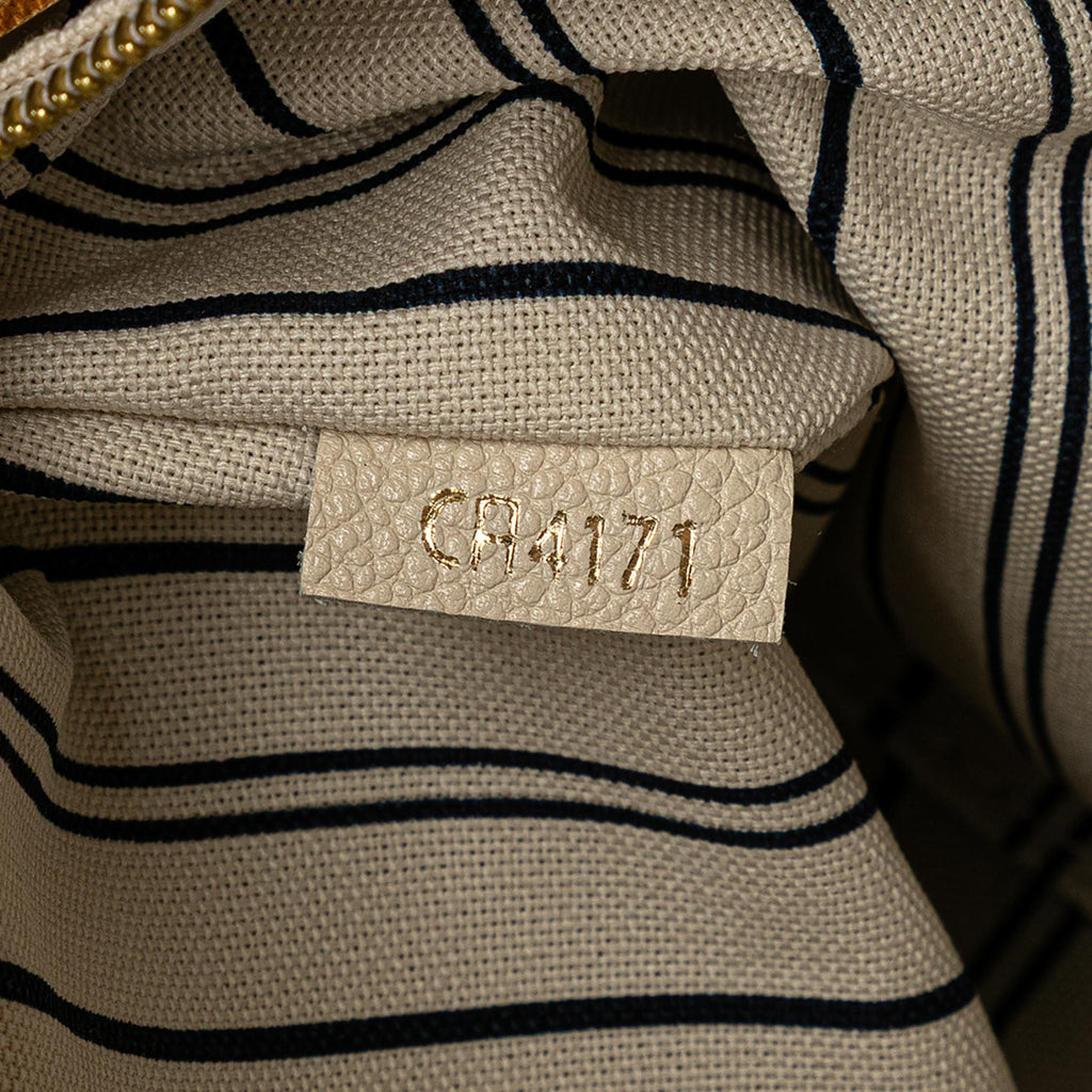 Louis Vuitton Monogram Empreinte Artsy MM