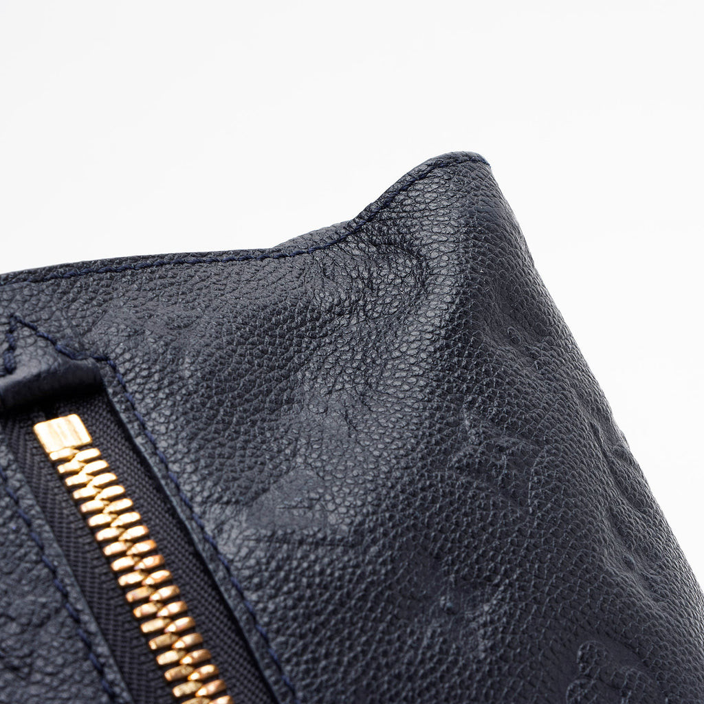 Louis Vuitton Monogram Empreinte Petillante Clutch