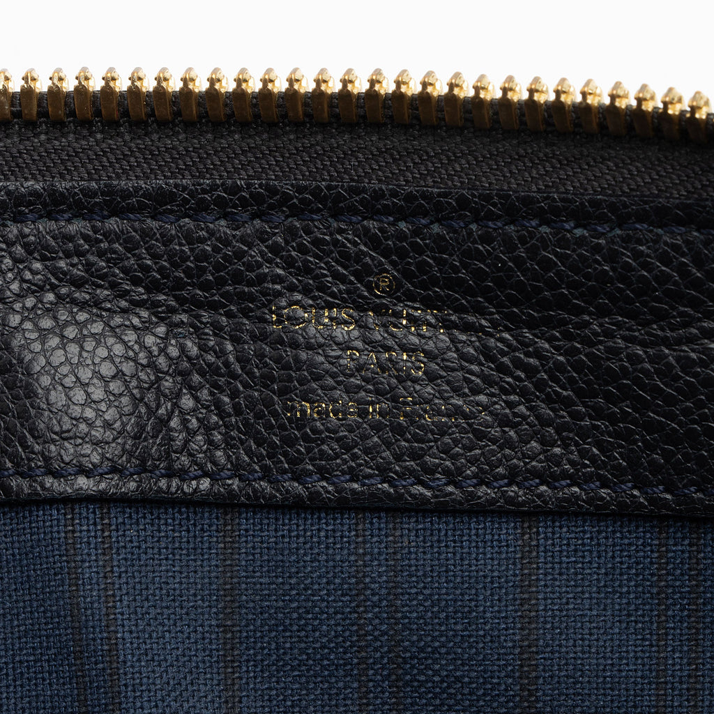 Louis Vuitton Monogram Empreinte Petillante Clutch