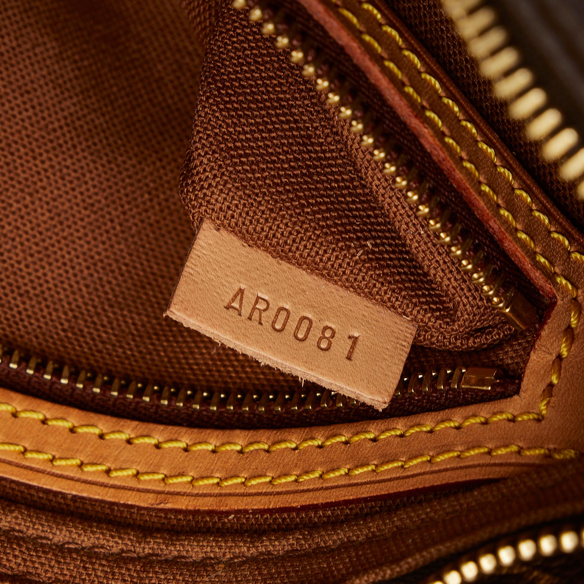 Louis Vuitton Monogram Trotteur (SHG-kLBYpm)