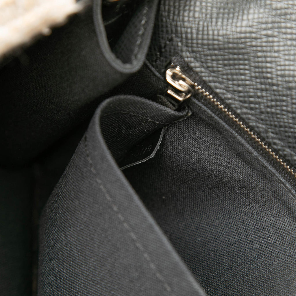 Louis Vuitton Taiga Belaia Clutch