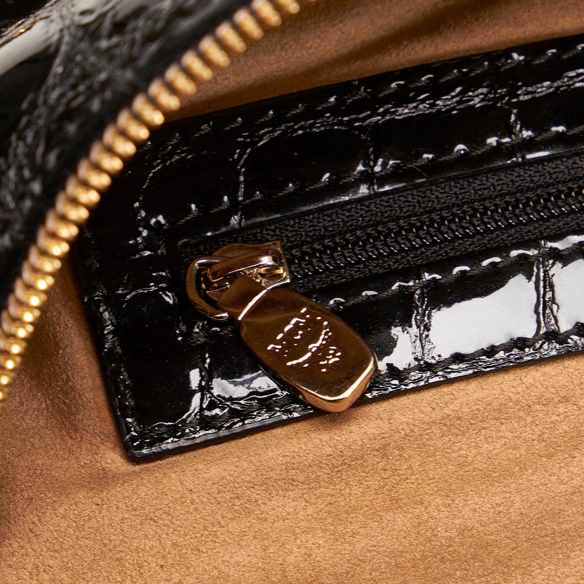 MCM Embossed Patent Leather Satchel (SHG-27971)